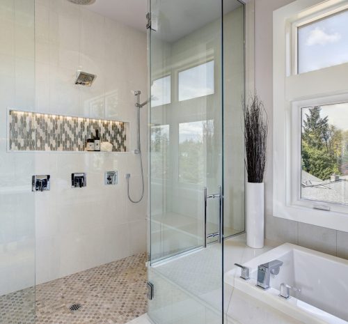 Contemporary master bathroom features glass walk-in shower, drop-in tub with a perfect window view. Northwest, USA